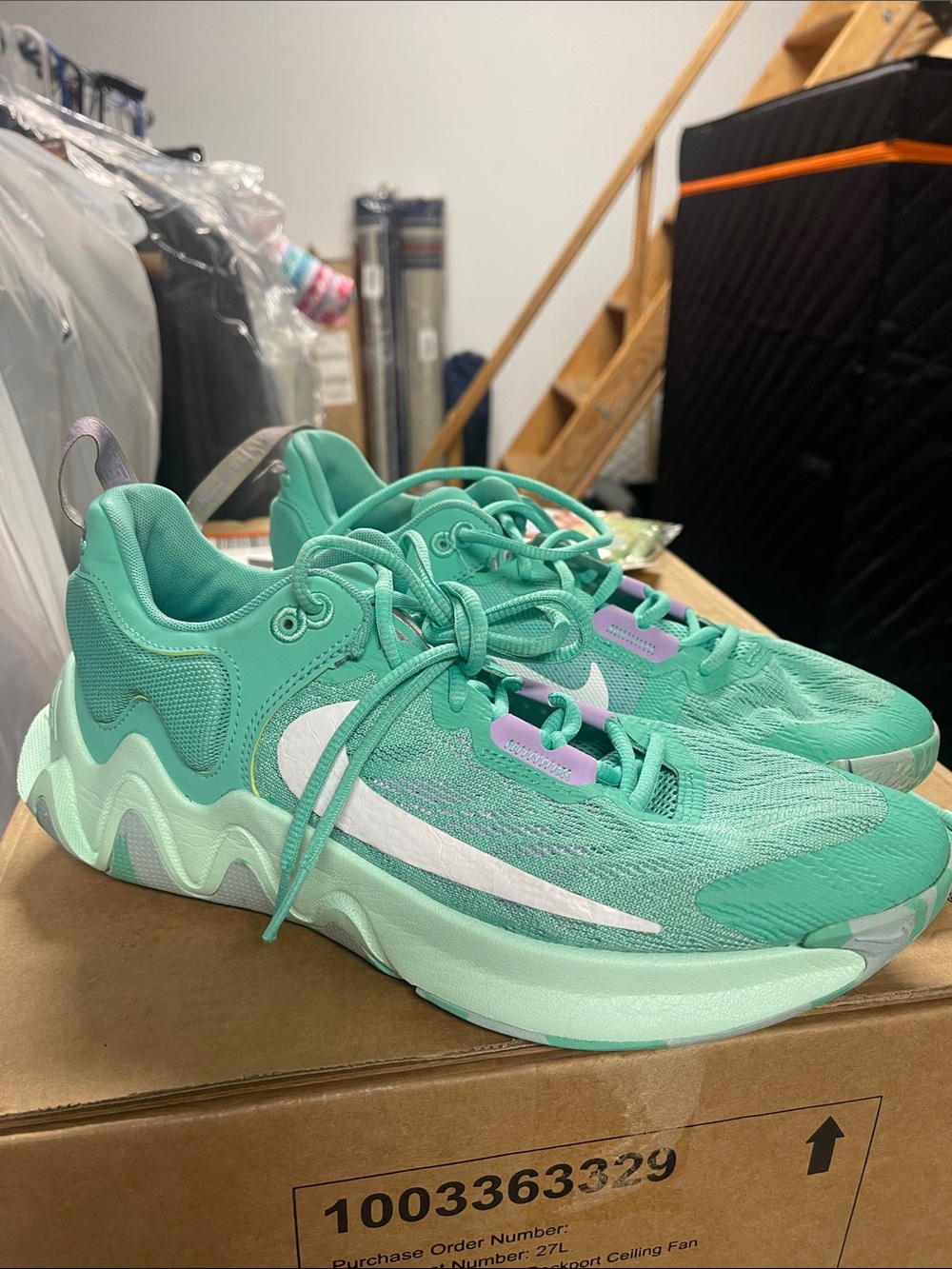 Nike Mint Teal Sneakers with White Swoosh and Purple Accents